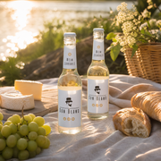 Don Blanc Weinschorle beim Picknick am Fluss