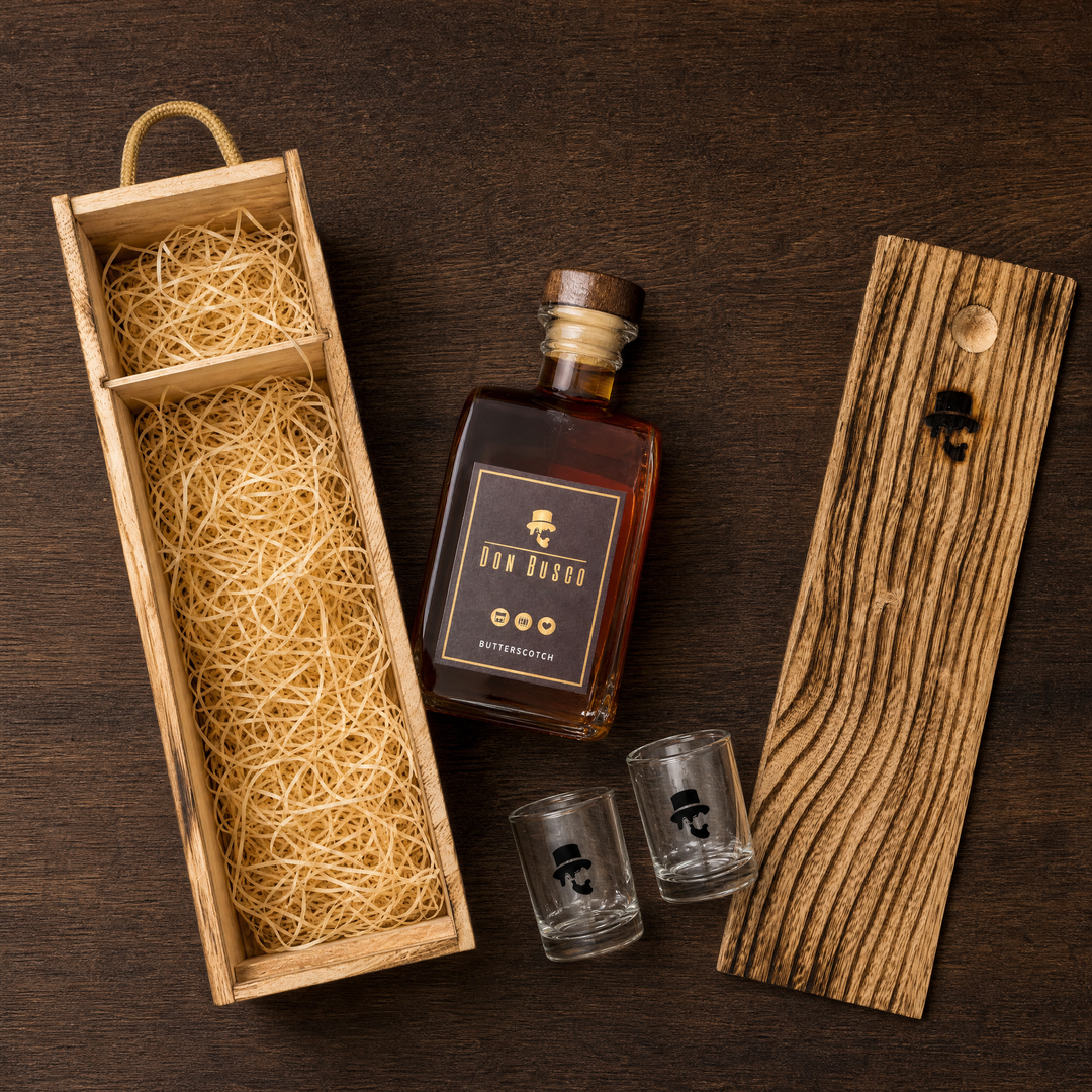 Inhalt des Geschenksets: Don Busco Flasche, zwei Shotgläser, Holzkiste mit Deckel