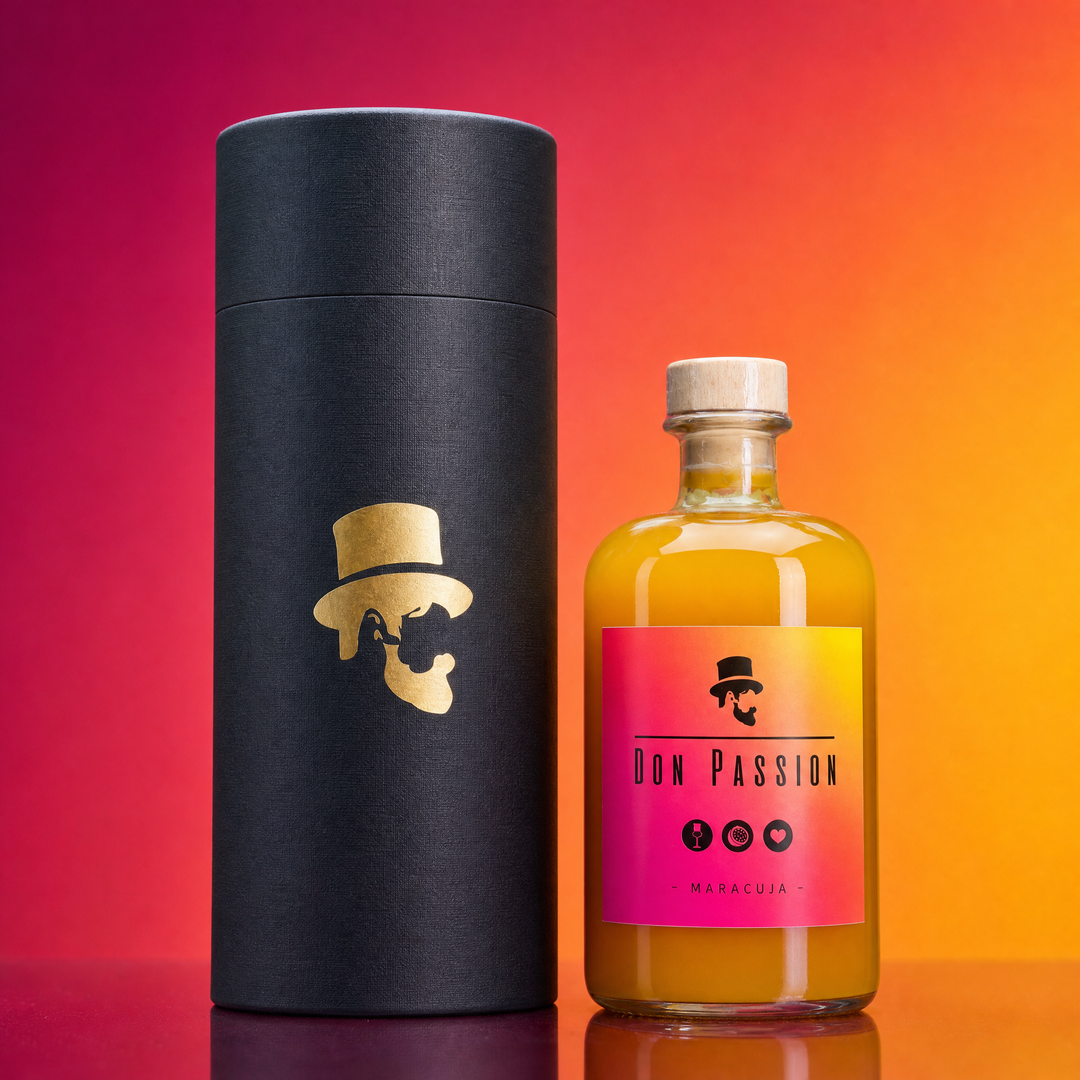 Don Passion Geschenkbox vor pink-orangem Farbverlauf