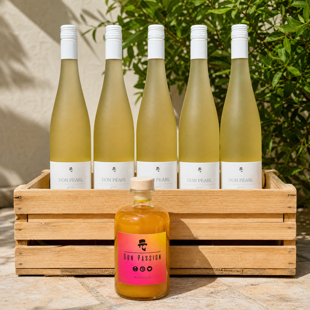 Lieferumfang Spritz-Set: fünf Flaschen Don Pearl in einer Holzkiste und eine Flasche Don Passion